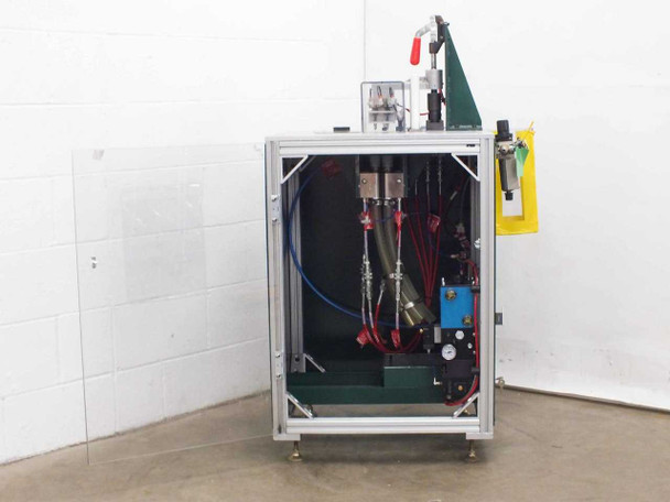 Custom blind rivet station with front cabinet door open showing interior — blue and red pneumatic tubing, TASQ intensifier pump, Norgren valve block, and pressure gauge visible