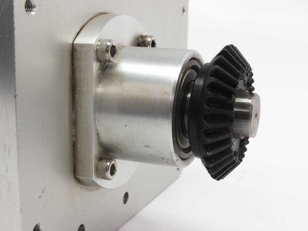 Bevel gear output end of the Sankyo Sandex P50 assembly mounted in aluminum end plate