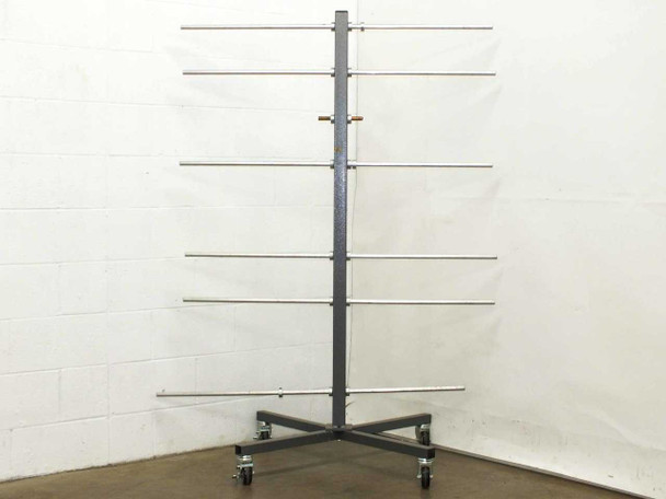 Industrial metal roll storage cart on swivel casters with 6 horizontal aluminum rod arms on a cross-base frame — full front view