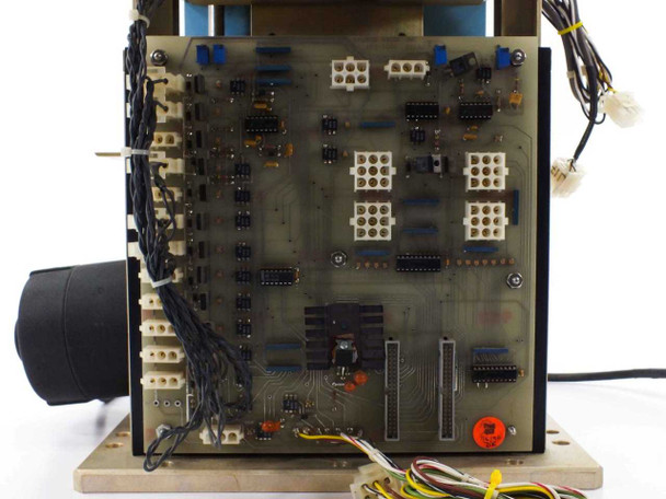 Laurier 690-2406 Rev B motherboard – close-up showing PCB with DIP ICs, multi-pin connectors, and discrete components