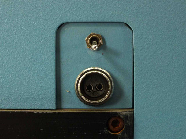 Laurier HA245 blue housing panel – close-up showing toggle switch and circular multi-pin connector (2-pin) on panel face
