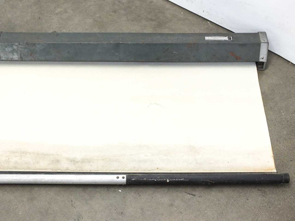 Da-Lite Model C screen partially unrolled showing matte white screen surface and bottom pull bar