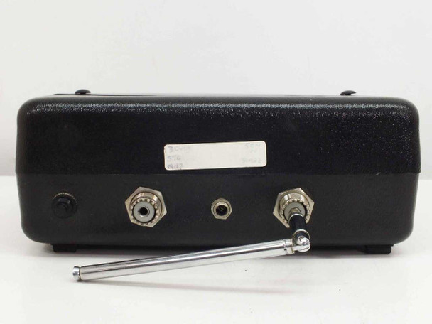 DSI 3550 Frequency Counter rear panel close-up showing coax connectors, label, and antenna laid flat