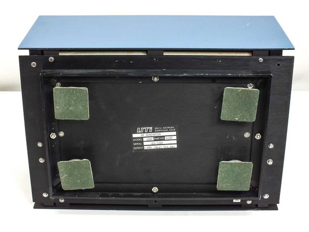 UTI 100C RF Generator bottom view showing chassis label and four rubber isolation feet
