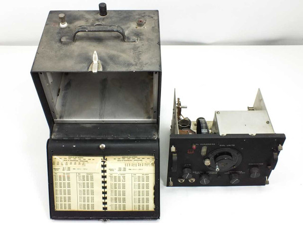 Philco BC-221-N with outer case open showing removable chassis unit alongside case with MC-177-N Calibration Book in lid tray
