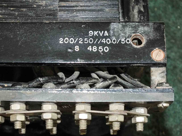 11062A transformer rating plate close-up showing 9KVA, 200/250/400/500V primary markings and serial S 4850