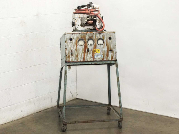 Eimac 2901 tube induction heater on rolling steel cart – full front view showing heavily rusted enclosure panels with three circular meter cutouts