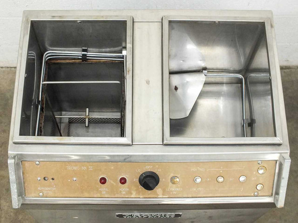 Tronic MK IV top-down view showing dual open bath tanks with wire rack insert in left tank