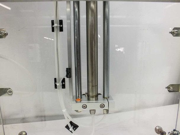 Exair 110018SS stainless steel air knife body – close-up of lower section with pneumatic fittings, orange fitting, and white tubing connections
