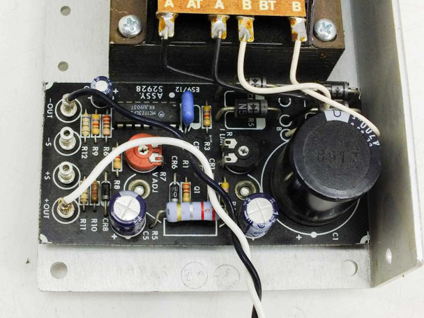 International Power IHB12-1.7 internal control PCB showing regulator IC, capacitors, resistors, and assembly markings