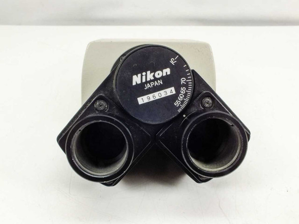 Nikon binocular microscope head – straight-on front view of dual eyepiece tubes and Nikon Japan label