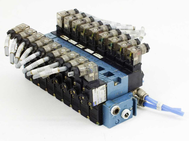 MAC 45A-NAC-DDFJ-2KD solenoid valve manifold bank — angled top-left view showing 10 valves with wiring and blue pneumatic tubing