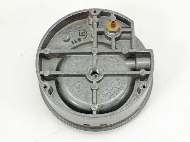 Dwyer 2040C Magnehelic Gauge – rear housing view showing cast metal back, brass pressure port fitting, and mounting details