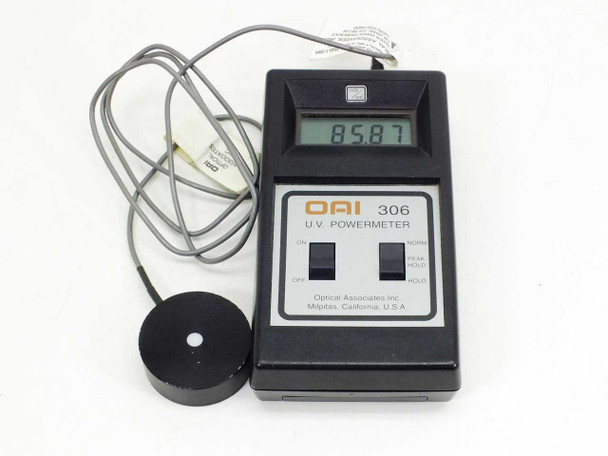 OAI 306 UV Powermeter front view showing LCD reading 85.87 mW/cm² with 365nm probe and cable
