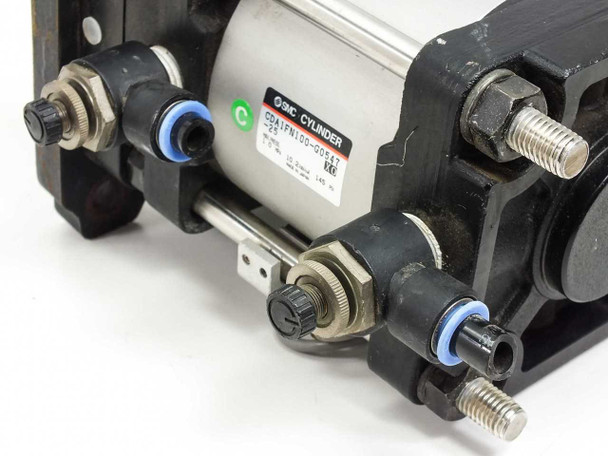 SMC CDA1FN100-G0547-25 front panel view showing push-in pneumatic fittings and position sensor mounting on cylinder body