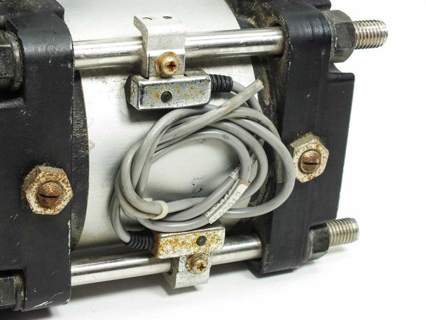 SMC CDA1FN100-G0547-25 rear end view showing two magnetic position sensors with grey wiring leads attached to cylinder