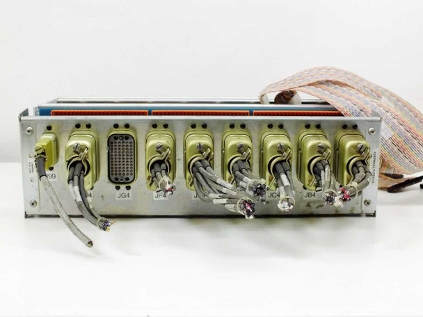 First Light Technology I/O chassis rear panel view showing large multi-pin connector, circular JG4/JB4/JF4 connectors, and attached cables
