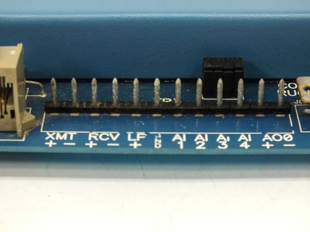 Rugid Computer RUG7C bottom edge I/O closeup — XMT+/-, RCV+/-, LF serial pins, AI1–AI4 analog input headers, AO0 analog output header
