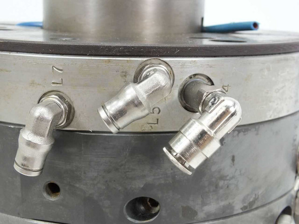AWM Netstal injection mold head – closeup of angled push-in fittings on mold body with stamped port labels L7 and related markings