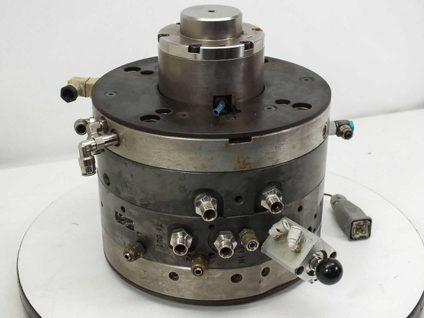 AWM Mold Tech AG Netstal DC injection mold head – front three-quarter view showing cylindrical body, top chuck, pneumatic fittings, and attached connector