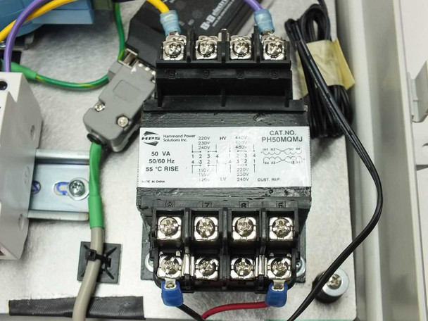 Close-up of Hammond Power Solutions PH50MQMJ 50 VA 50/60 Hz transformer with wiring terminals inside enclosure