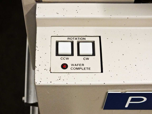 Front panel control surface of PWS 23 showing ROTATION CCW/CW buttons and WAFER COMPLETE indicator light