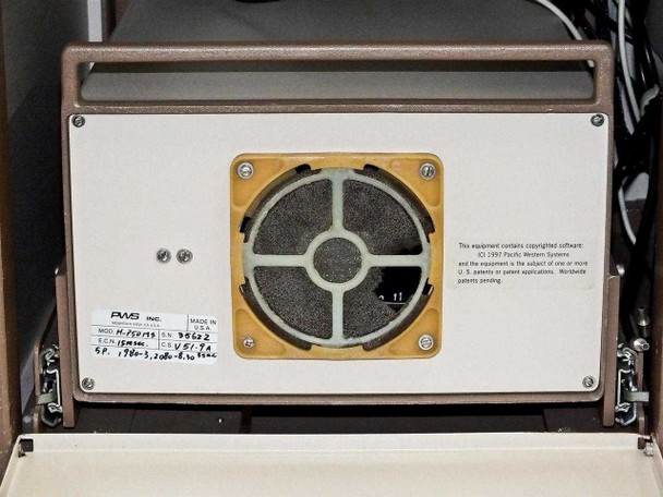 Rear panel of PWS P5NMS showing PWS nameplate with model H-P5NMS, serial 35662, SP 15mm, CE V51-TA, power spec label, and large circular filtered exhaust/fan opening — copyright notice visible