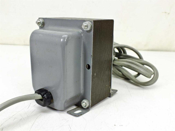 Unbranded 120V isolation transformer — right-side view showing laminated core stack, gray metal enclosure, mounting bracket feet, and output cable routing