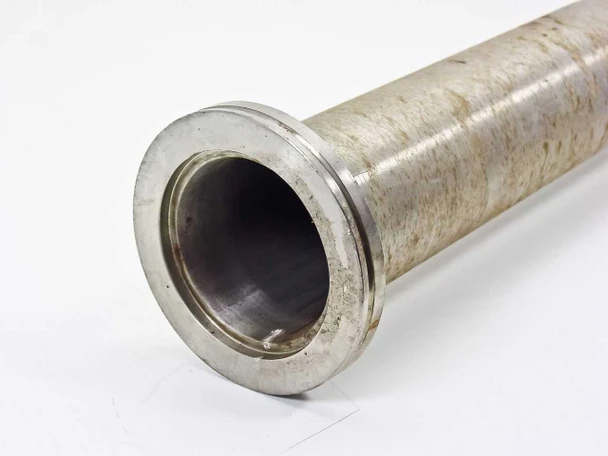 Close-up of NW63 KF63 stainless steel flange end showing bore interior and flange face profile
