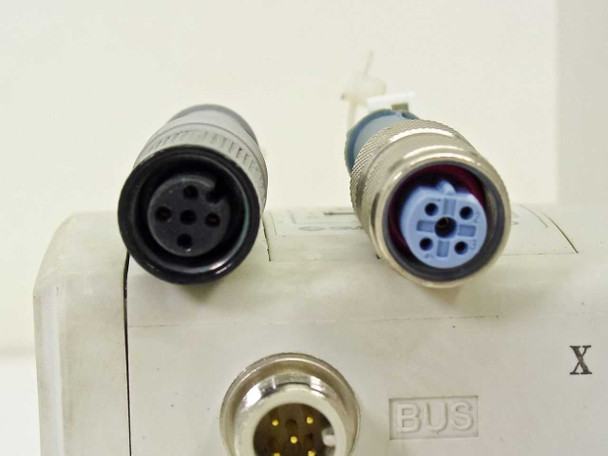 SMC EX250-SDN1 DeviceNet manifold — close-up of M12 female BUS connectors showing 5-pin configuration with mating connectors attached