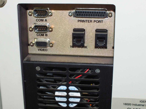 Origen IGEN M-Series M8 rear I/O panel showing COM A, COM B, Video, Printer Port, Network, and Modem connectors with cooling fan