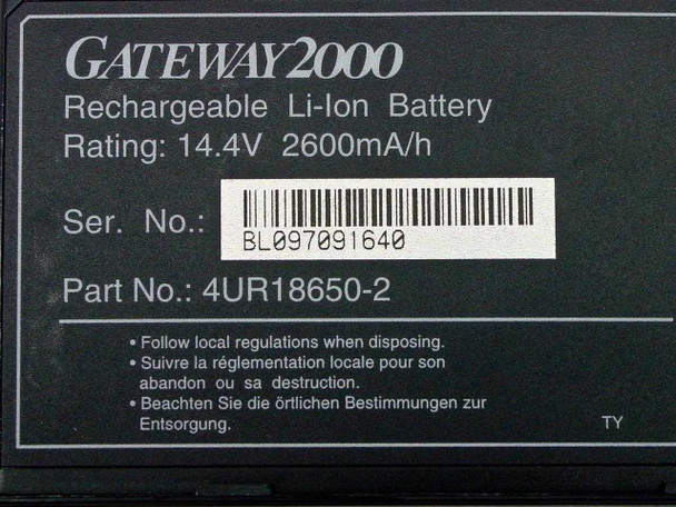 Gateway 2000 4UR18650-2 battery label close-up showing serial number BL097091640, part number, and 14.4V 2600mAh rating