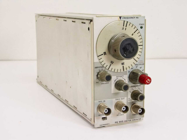 Tektronix FG 503 Function Generator Plug-In – front-left three-quarter view showing frequency dial, amplitude knob, offset control, function selector, multiplier switch, VCF In, Trig Out, and output BNC connectors