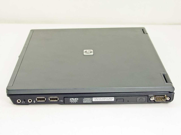 HP Compaq nc6230 – right side view showing dual USB ports, audio jacks, DVD-ROM drive, and DB-9 serial port