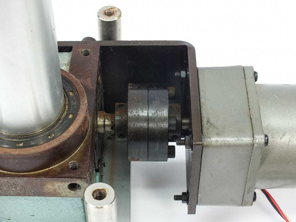 Tung Lee 4RK25GN-C motor and gearhead interior – side cover removed showing internal gear cluster and coupling between motor and indexing drive