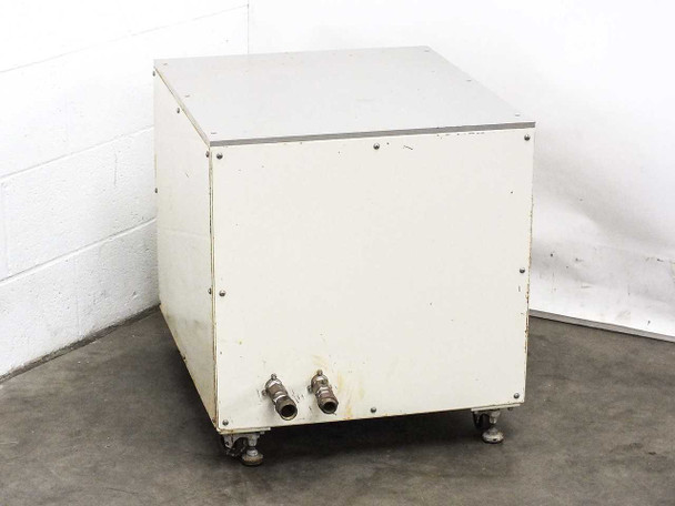 Custom water filtration enclosure rear view showing two threaded inlet and outlet hose-barb fittings at lower right