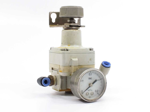SMC IR2000-02 precision regulator front-left view with attached 0-0.2 MPa gauge and blue push-in fittings
