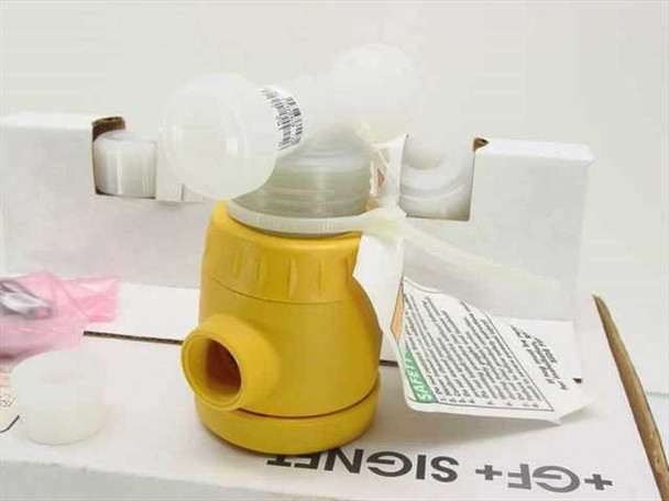 GF Signet 152 321 221 yellow vortex flow sensor body with white union fitting and cap, shown outside box