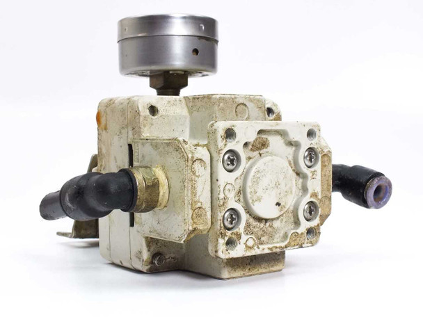 SMC IR3010-02BG rear view showing port openings, push-in fittings, and mounting bracket with surface corrosion and discoloration