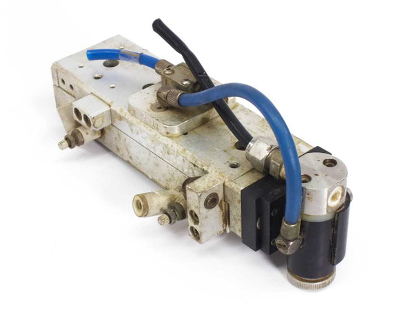 SMC MXS12-75 Pneumatic Slide Table top view showing body, fittings, blue tubing, and black solenoid valve