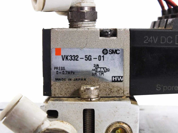 SMC VK332-5G-01 label closeup showing model number, 0–0.7 MPa pressure rating, 24VDC marking, and Made in Japan designation