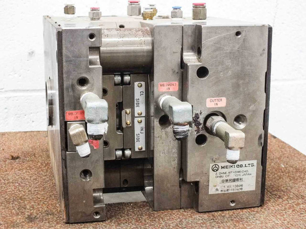 Meiki MDMI injection mold opposite side view showing CUTTER IN, INJ. SIDE, WE(HOT) IN, and CL SIDE labeled fittings with Meiki Co. Ltd. label
