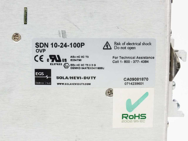 Sola SDN 10-24-100P – label closeup showing model number, OVP designation, hazardous location certifications, RoHS mark, and Sola/Hevi-Duty branding