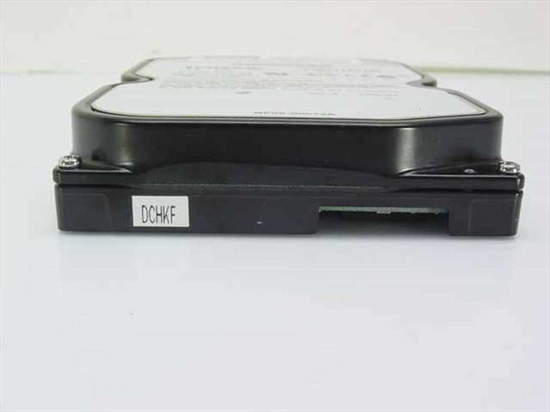 TriGem SV0211A/TGE 2.1GB IDE hard drive — side edge view showing IDE connector slot and asset tag label