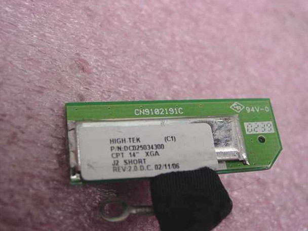 Toshiba DC025034300 LCD harness label closeup showing part number DCB25034300, 14-inch XGA, J2 SHORT, Rev 2.0, date code 02/11/06