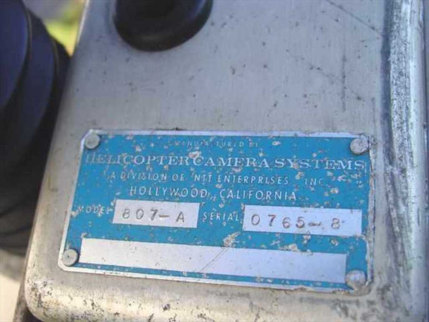 Helicopter Camera Systems manufacturer plate: Model 807-A, Serial 0765-B, NTT Enterprises Inc., Hollywood California