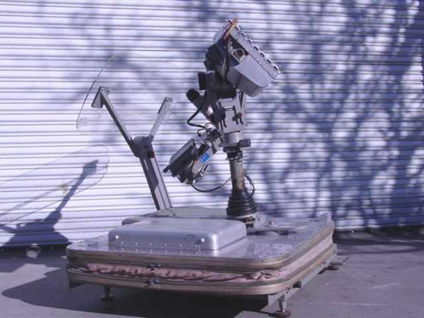 Helicopter Camera Systems 807-A film camera mount system with 806A side arm, full assembly view outdoors on platform base