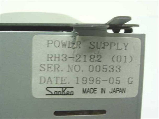 Sanken RH3-2182 (01) power supply label close-up showing model number, serial 00533, date 1996-05, and Made in Japan markings