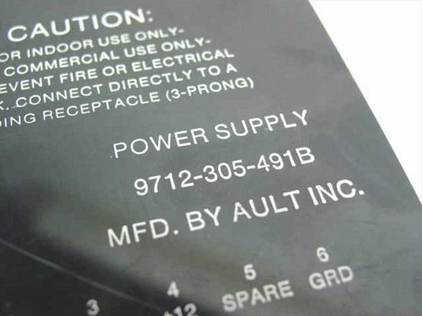 NEC 9712-305-491B bottom label showing POWER SUPPLY model number and MFD. BY AULT INC. with caution indoor/commercial use text