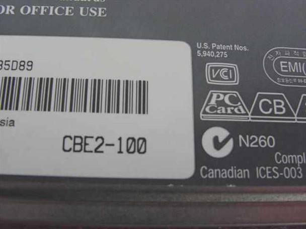 Xircom CBE2-100 rear label showing model CBE2-100, barcode, PC Card and CB certifications, Canadian ICES-003
